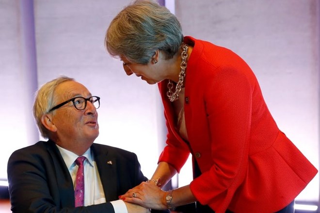Juncker še vedno verjame v dogovor o brexitu novembra