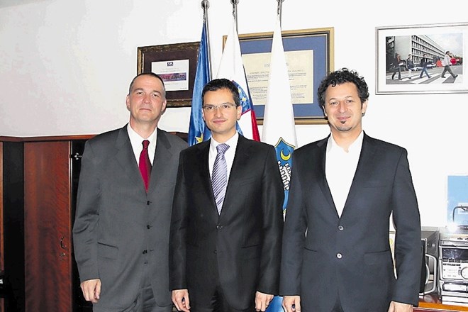 Tomaž Besek in Patrick Vlačič, tedaj minister za promet, sta novembra 2011 obiskala kamniškega župana Marjana Šarca.