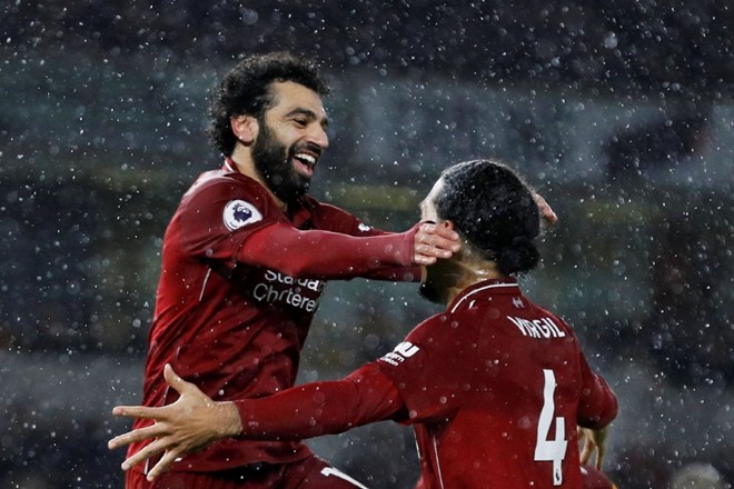 Mohamed Salah in Virgil van Dijk sta dosegla zadetka za vodilni Liverpool.