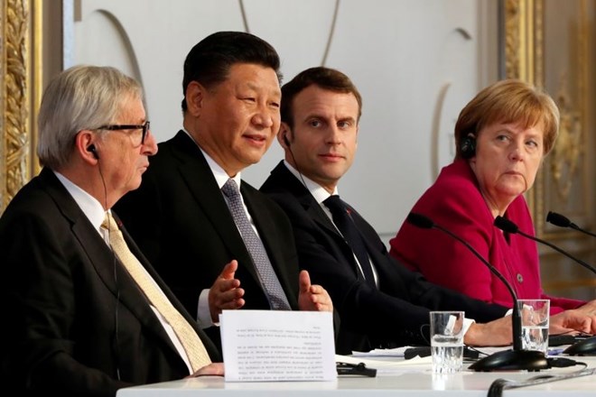Emmanuel Macron, Angela Merkel in Jean-Claude Juncker so se v Parizu srečali s kitajskim voditeljem Xi Jinpingom.