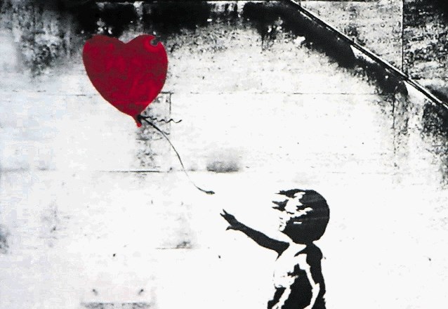 Deklica z rdečim balonom, grafit v Londonu