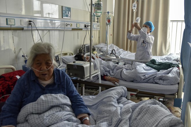 V eni od kitajskih provinc za covidom zbolelo kar 90 odstotkov ljudi


