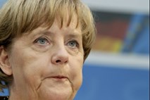 Merklova kljub porazu FDP v Berlinu ne vidi težav za koalicijo