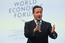 Cameron v Davosu davek na finančne transakcije označil za norost