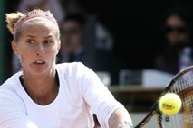 Turnir WTA v Miamiju: Hercogova sedmi nosilki Bartolijevi vzela zgolj prvi niz