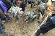 Pod zemeljskim plazom na Kitajskem umrlo vseh 18 učencev