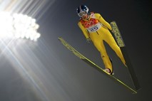 Vogtovi zmaga na prvi olimpijski tekmi skakalk, Takanašijeva brez medalje; Vtičeva 6., Požunova 11.