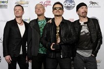Bono se opravičuje za samodejni prenos U2 albuma v iCloud
