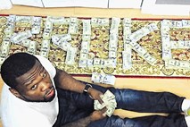 Rumene novice: Bankrotirani 50 Cent, polikana obraza Cruisa in  Travolte