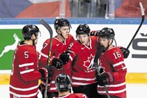 Kanada brani naslov svetovnega prvaka, Matjaž Rakovec lovi mandat v IIHF