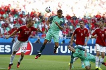 Šest golov v remiju Madžarov in Portugalcev; Islandci premagali in izločili Avstrijce