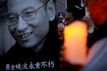 Strah kitajskih oporečnikov, da se je Zahod pred Pekingom odločil molčati zaradi gospodarskih interesov 