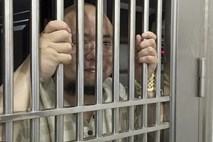 Kitajski bloger zaradi rušenja oblasti obsojen na osem let zapora