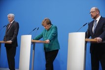 Člani CDU kritični do Merklove zaradi razdelitve ministrstev