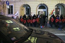 Madžarski predsednik kljub protestom podpisal sporno delovno zakonodajo