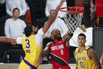 Lakers in Milwaukee izenačila, Lillard poškodovan