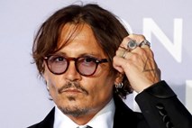 Sodišče: Johnny Depp je pretepač žensk