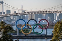 Olimpijska plamenica prispela v Tokio v pogrebnem vzdušju