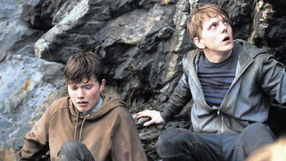 Film 22. julij v režiji Paula Greengrassa je eksploativni, holivudizirani prikaz pokola na norve&scaron;kem otoku Utoya, ki omenjeno tragedijo izkoristi za solzavo dramo.