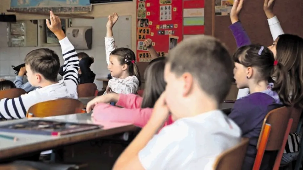 Mnogi otroci in star&scaron;i so zadovoljni &scaron;ele z ocenama &scaron;tiri ali pet (fotografija je simbolična).
