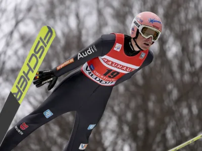 Germany's Severin Freund competes during trial round of the FIS Ski Flying World Cup in Oberstdorf, Germany, Saturday, March 19, 2022. (AP Photo/Matthias Schrader)