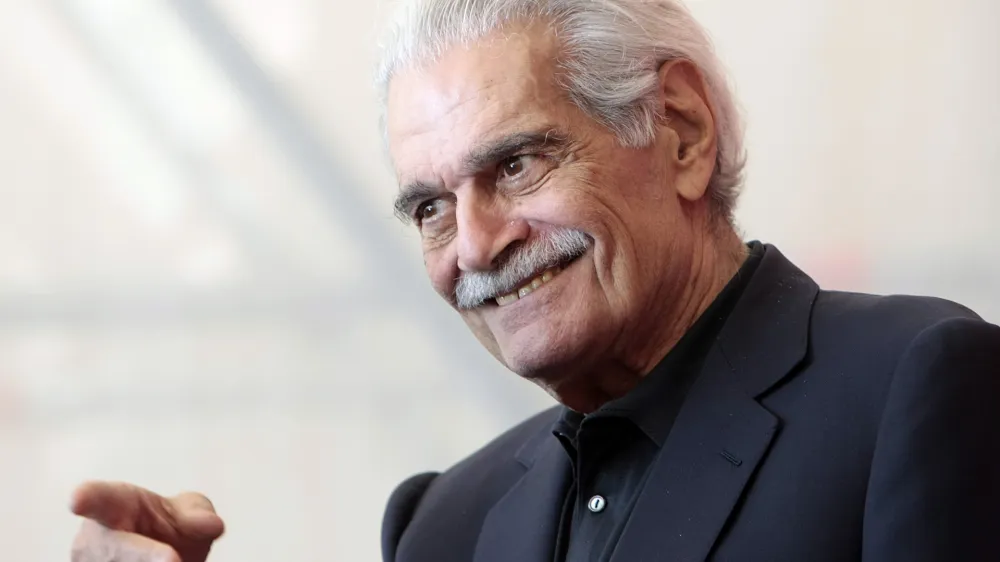 FILE - In this Thursday, Sept. 10, 2009 file photo, Egyptian actor Omar Sharif gestures during the photo call for the film 'Al Mosafer (The Traveller)' at the 66th edition of the Venice Film Festival in Venice, Italy. Sharif has died in a Cairo hospital of a heart attack, his agent said on Friday, July 10, 2015. (AP Photo/Andrew Medichini, File)