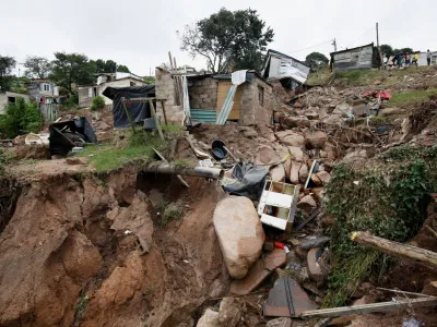 The remains of a home which was destroyed leaving two children dead after flooding are seen in Lindelani, Durban, South Africa, April 15, 2022. REUTERS/Rogan Ward