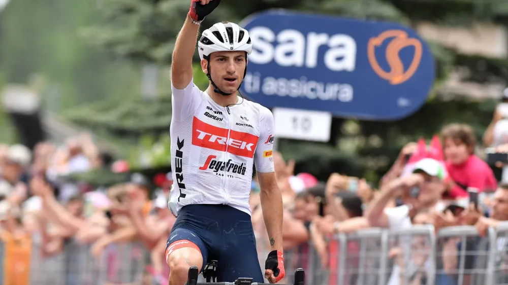Cycling - Giro d'Italia - Stage 15 - Rivarolo Canavese to Cogne, Italy - May 22, 2022 Trek - Segafredo's Giulio Ciccone celebrates after crossing the line to win stage 15 REUTERS/Jennifer Lorenzini