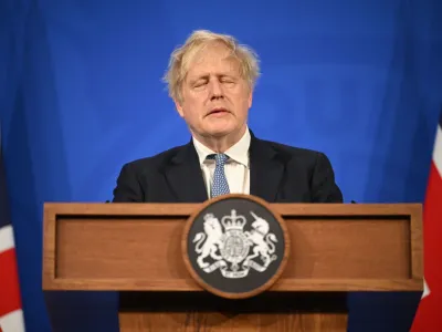 Britain's Prime Minister Boris Johnson speaks during a press conference in Downing Street, London, Wednesday, May 25 2022, following the publication of Sue Gray's report into Downing Street parties in Whitehall. An investigative report blames British Prime Minister Boris Johnson and other senior leaders for allowing boozy government parties that broke the U.K.'s COVID-19 lockdown rules. While Johnson said he took "full responsibility" for the breach, he insisted he would not resign. (Leon Neal/Pool Photo via AP)