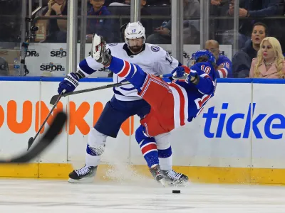 Jun 1, 2022; New York, New York, USA; Tampa Bay Lightning left wing Alex Killorn (17) hits New York Rangers left wing Artemi Panarin (10) in the third period of game one of the Eastern Conference Final of the 2022 Stanley Cup Playoffs at Madison Square Garden. Mandatory Credit: Danny Wild-USA TODAY Sports