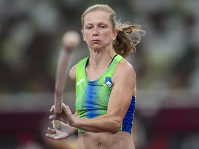 Tina Sutej, of Slovenia, competes in qualifications for the women's pole vault at the 2020 Summer Olympics, Monday, Aug. 2, 2021, in Tokyo. (AP Photo/Matthias Schrader)