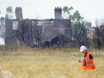 20 July 2022, United Kingdom, Wennington: The scene after a blaze in the village of Wennington, east London after temperatures topped 40C in the UK for the first time ever, as the sweltering heat fuelled fires and widespread transport disruption. Photo: Kirsty O'connor/PA Wire/dpa