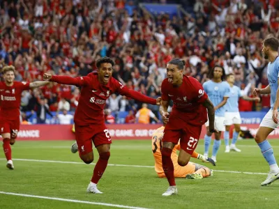 Soccer Football - Community Shield - Liverpool v Manchester City - King Power Stadium, Leicester, Britain - July 30, 2022 Liverpool's Darwin Nunez celebrates scoring their third goal with Fabio Carvalho Action Images via Reuters/Andrew Boyers