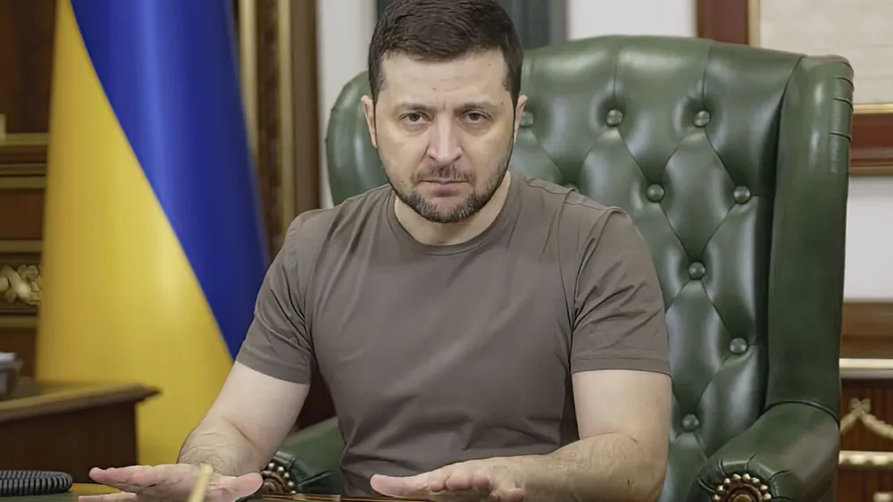 In this image from video provided by the Ukrainian Presidential Press Office and posted on Facebook early Tuesday, March 15, 2022, Ukrainian President Volodymyr Zelenskyy speaks in Kyiv, Ukraine. (Ukrainian Presidential Press Office via AP)