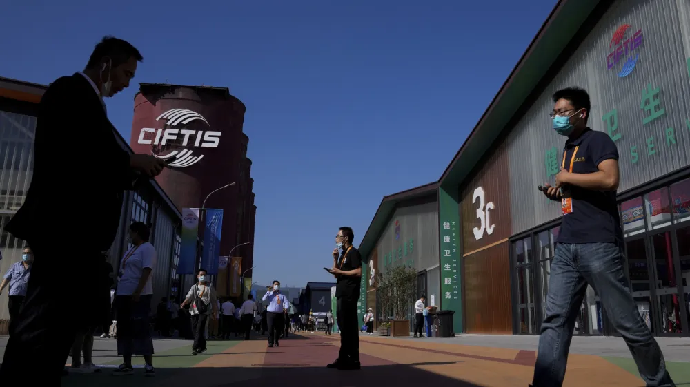 Visitors tour the China International Fair for Trade in Services (CIFTIS) at the Shougang venue in Beijing, Thursday, Sept. 1, 2022. (AP Photo/Andy Wong)