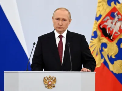 Russian President Vladimir Putin attends a ceremony to declare the annexation of the Russian-controlled territories of four Ukraine's Donetsk, Luhansk, Kherson and Zaporizhzhia regions, after holding what Russian authorities called referendums in the occupied areas of Ukraine that were condemned by Kyiv and governments worldwide, in the Georgievsky Hall of the Great Kremlin Palace in Moscow, Russia, September 30, 2022. Sputnik/Grigory Sysoyev/Pool via REUTERS ATTENTION EDITORS - THIS IMAGE WAS PROVIDED BY A THIRD PARTY.
