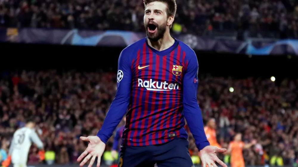 FILE PHOTO: Soccer Football - Champions League - Round of 16 Second Leg - FC Barcelona v Olympique Lyonnais - Camp Nou, Barcelona, Spain - March 13, 2019 Barcelona's Gerard Pique celebrates scoring their fourth goal        REUTERS/Juan Medina/File Photo