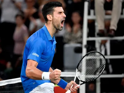05 November 2022, France, Paris: Serbian tennis player Novak Djokovic celebrates defeating Greek Stefanos Tsitsipas at their men's singles semi-final tennis match on day 6 of the ATP World Tour Masters 1000 at The AccorHotels Arena. Photo: Julien De Rosa/AFP/dpa
