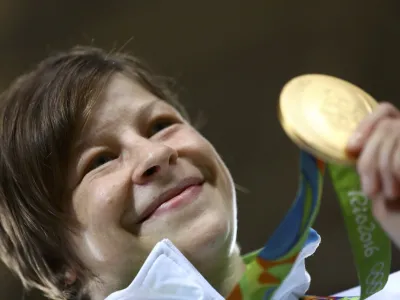 2016 Rio Olympics - Judo - Victory Ceremony - Women -63 kg Victory Ceremony - Carioca Arena 2 - Rio de Janeiro, Brazil - 09/08/2016. Tina Trstenjak (SLO) of Slovenia poses with her medal. REUTERS/Kai Pfaffenbach FOR EDITORIAL USE ONLY. NOT FOR SALE FOR MARKETING OR ADVERTISING CAMPAIGNS.