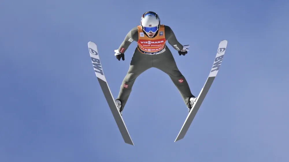 Halvor Egner Granerud, of Norway, soars through the air during his second round jump in the men's World Cup large hill ski jumping competition on Saturday, Feb. 11, 2023, in Lake Placid, N.Y. (AP Photo/Hans Pennink)