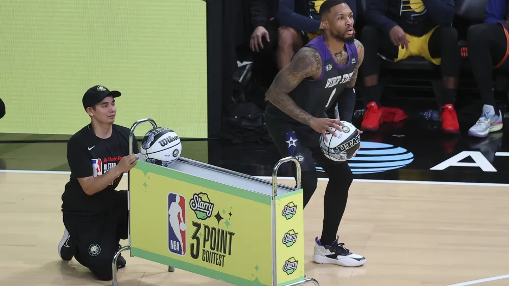 Damian Lillard of the Portland Trail Blazers shoots during the three-point contest at the NBA basketball All-Star weekend Saturday, Feb. 18, 2023, in Salt Lake City. (AP Photo/Rob Gray)