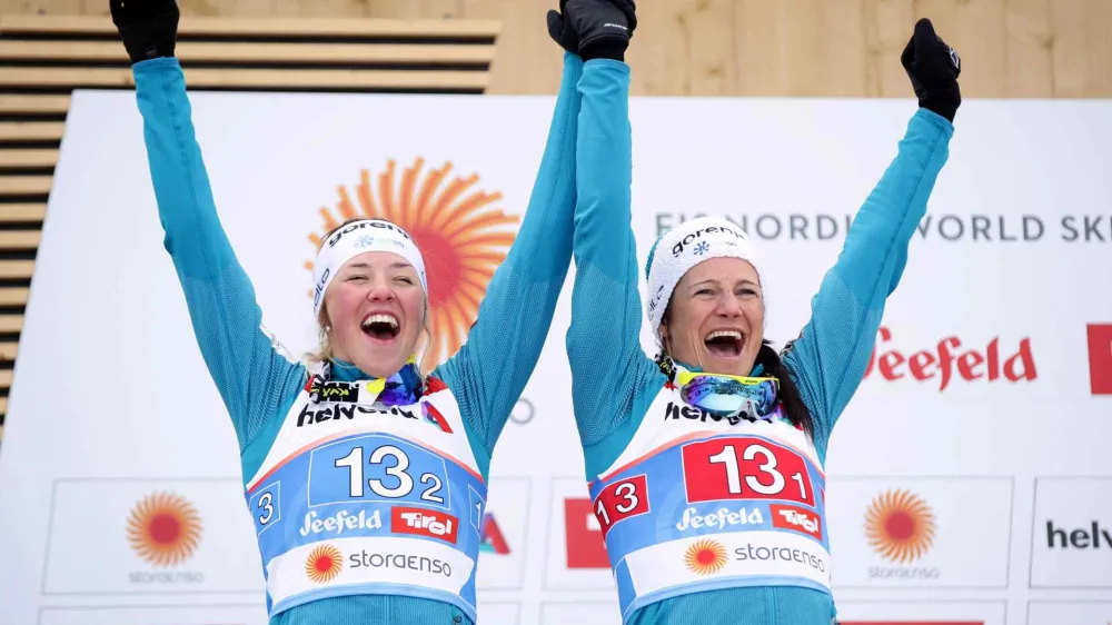 Cross-country skiing - FIS Nordic World Ski Championships - Women's Teamsprint - Seefeld, Austria - February 24, 2019 - Slovenia&acirc;&euro;&trade;s Katja Visnar and Anamarija Lampic celebrate on the podium. REUTERS/Lisi Niesner