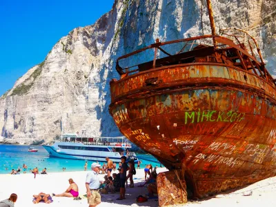 Zakynthos, Greece, Nov-2021: Ship Wreck at Navagio bay and Ship Wreck beach in summer. The most famous natural landmark of Zakynthos