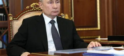 Russian President Vladimir Putin listens to United Russia Party General Council Secretary Andrei Turchak during their meeting at the Kremlin in Moscow, Russia, Monday, April 24, 2023. (Mikhail Klimentyev/Sputnik, Kremlin Pool Photo via AP)