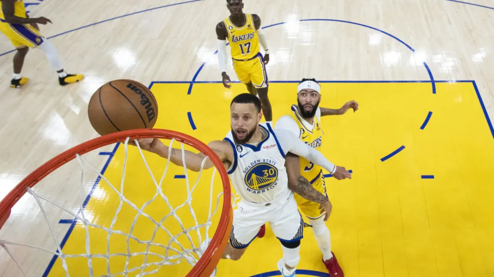 May 10, 2023; San Francisco, California, USA; Golden State Warriors guard Stephen Curry (30) shoots the basketball against Los Angeles Lakers forward Anthony Davis (3) during the third quarter in game five of the 2023 NBA playoffs conference semifinals round at Chase Center. Mandatory Credit: Kyle Terada-USA TODAY SportsMay 10, 2023; San Francisco, California, USA; XXXX during the first half in game five of the 2023 NBA playoffs conference semifinals round at Chase Center. Mandatory Credit: Kyle Terada-USA TODAY Sports