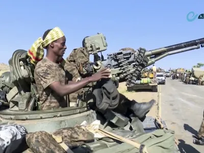 This image made from undated video released by the state-owned Ethiopian News Agency on Monday, Nov. 16, 2020 shows Ethiopian military in an armored personnel carrier, on a road in an area near the border of the Tigray and Amhara regions of Ethiopia. Ethiopia's prime minister Abiy Ahmed said in a social media post on Tuesday, Nov. 17, 2020 that "the final and crucial" military operation will launch in the coming days against the government of the country's rebellious northern Tigray region. (Ethiopian News Agency via AP)