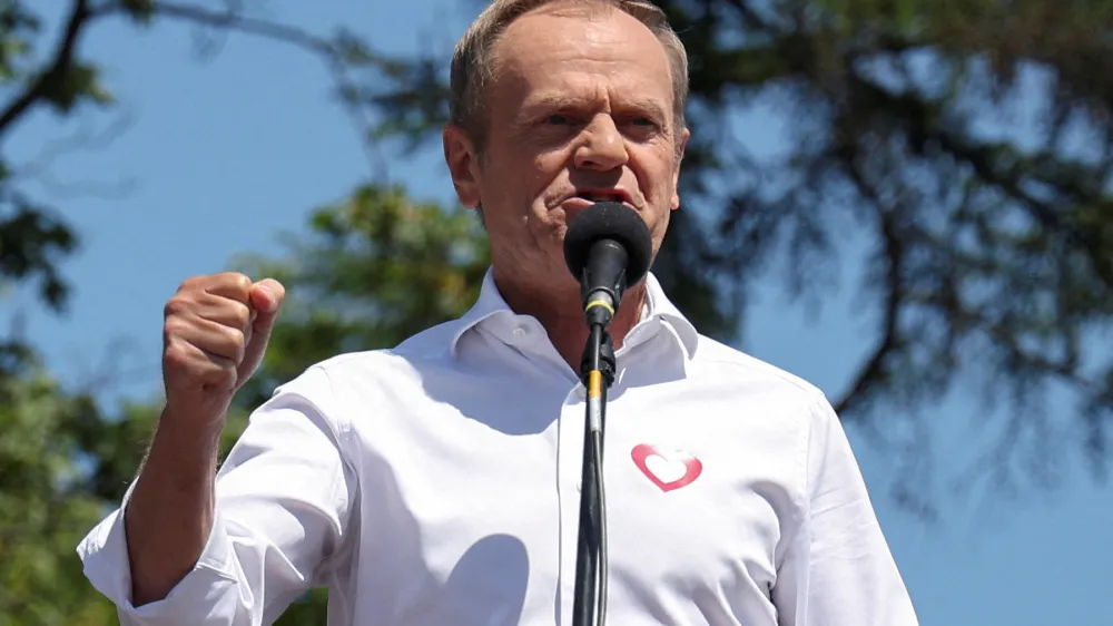 FILE PHOTO: Leader of main opposition party Civic Platform (PO) Donald Tusk takes part in the march on the 34th anniversary of the first democratic elections in postwar Poland, in Warsaw, Poland, June 4, 2023. REUTERS/Kacper Pempel/File Photo
