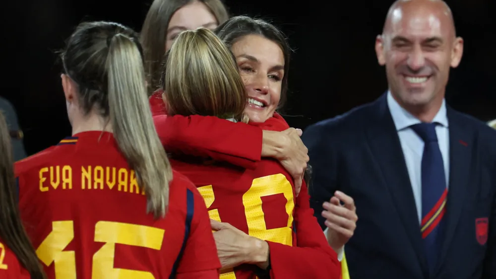 Soccer Football - FIFA Women's World Cup Australia and New Zealand 2023 - Final - Spain v England - Stadium Australia, Sydney, Australia - August 20, 2023 Spain's Queen Letizia and President of the Royal Spanish Football Federation Luis Rubiales celebrate with Olga Carmona after winning the World Cup final REUTERS/Asanka Brendon Ratnayake