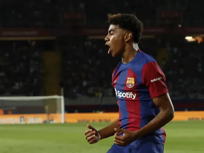 Soccer Football - LaLiga - FC Barcelona v Sevilla - Estadi Olimpic Lluis Companys, Barcelona, Spain - September 29, 2023 FC Barcelona's Lamine Yamal celebrates after Sevilla's Sergio Ramos scores an own goal and FC Barcelona's first REUTERS/Albert Gea