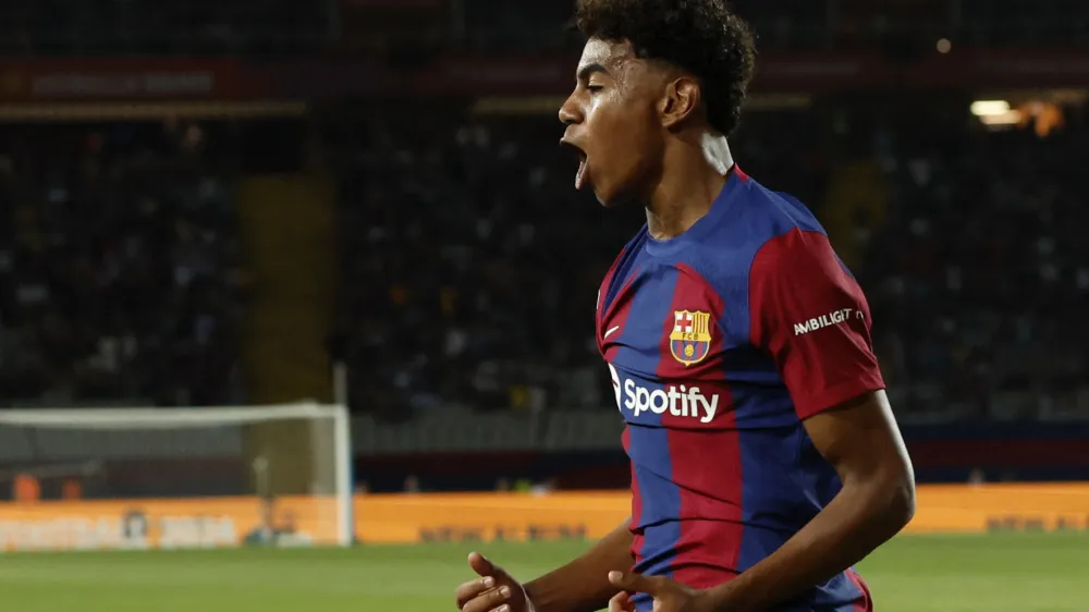 Soccer Football - LaLiga - FC Barcelona v Sevilla - Estadi Olimpic Lluis Companys, Barcelona, Spain - September 29, 2023 FC Barcelona's Lamine Yamal celebrates after Sevilla's Sergio Ramos scores an own goal and FC Barcelona's first REUTERS/Albert Gea